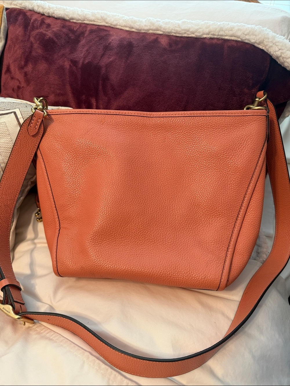 Coach Coral Pebbled Leather Dufflette crossbody bag. Adjustable strap. like new